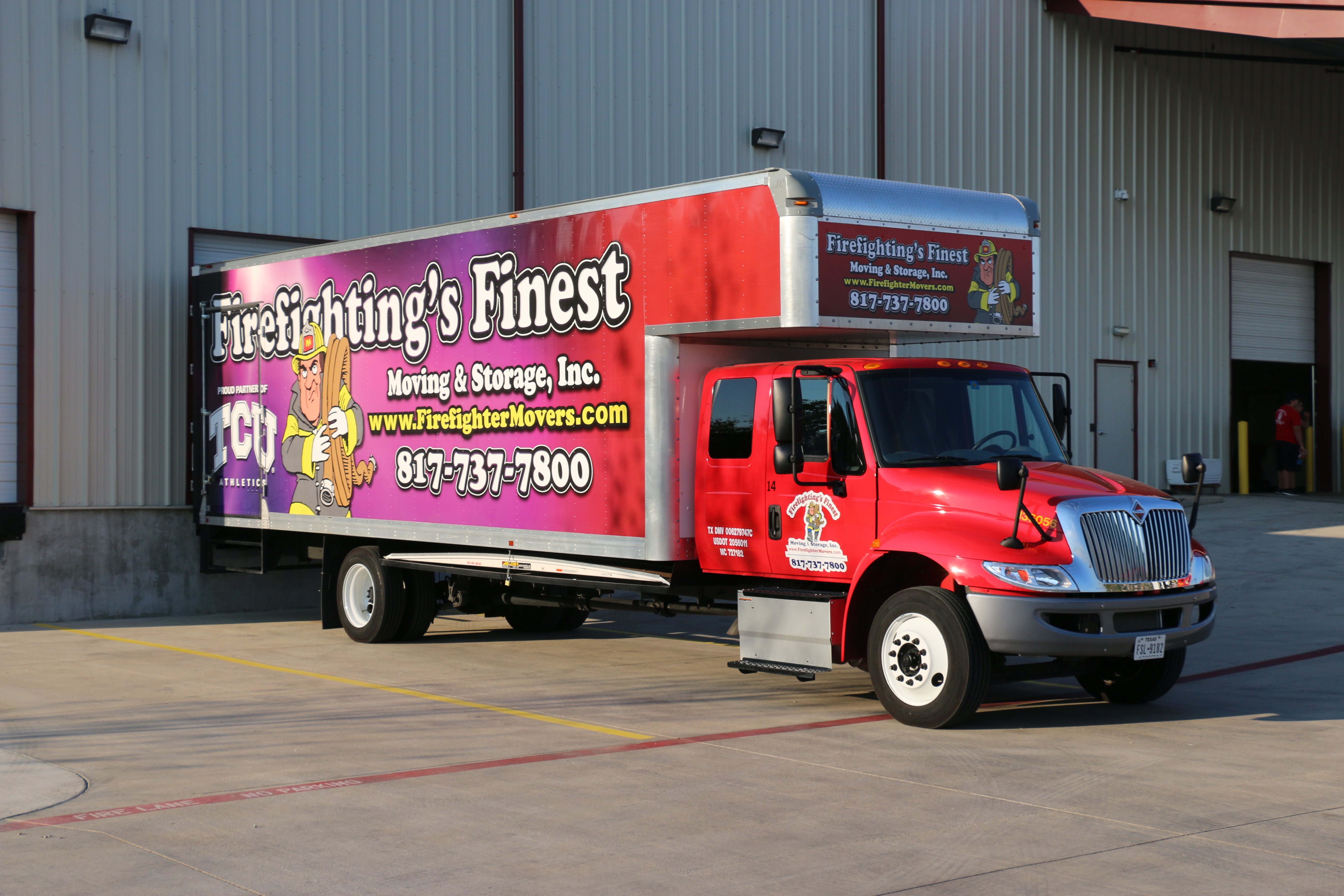 Firefighting's Finest Moving and Storage Company truck at warehouse
