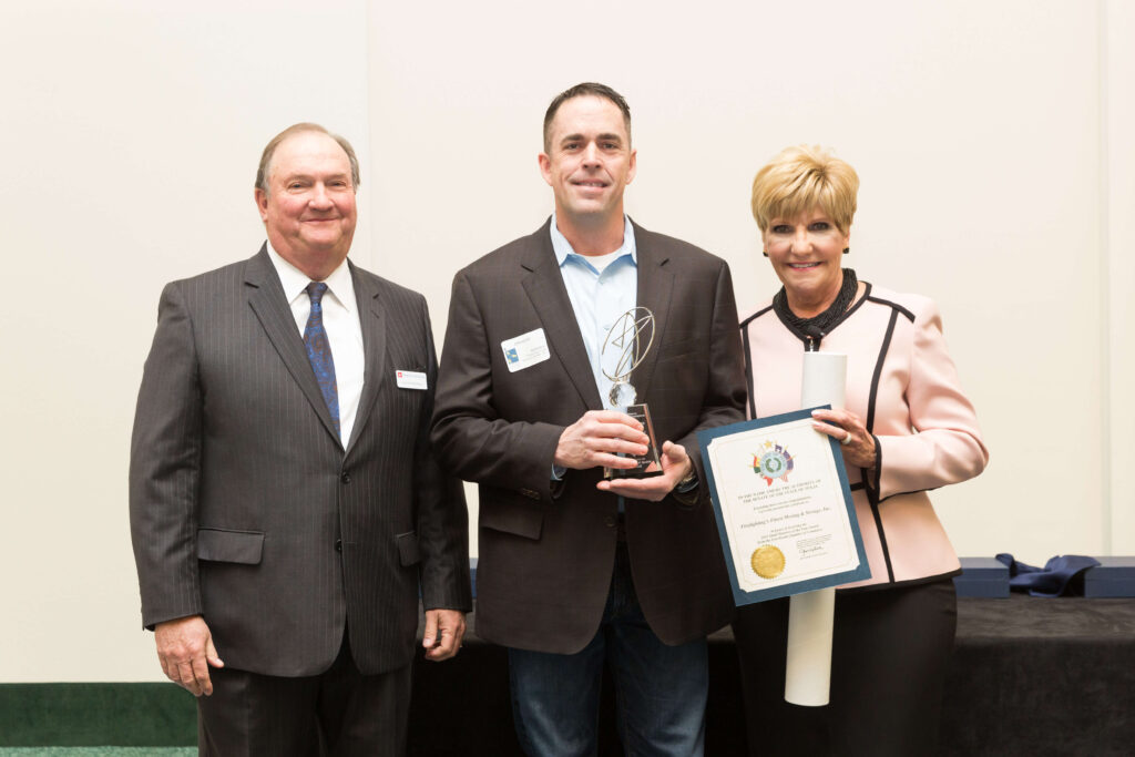 Firefighting's Finest Moving & Storage team holding their awards in Texas
