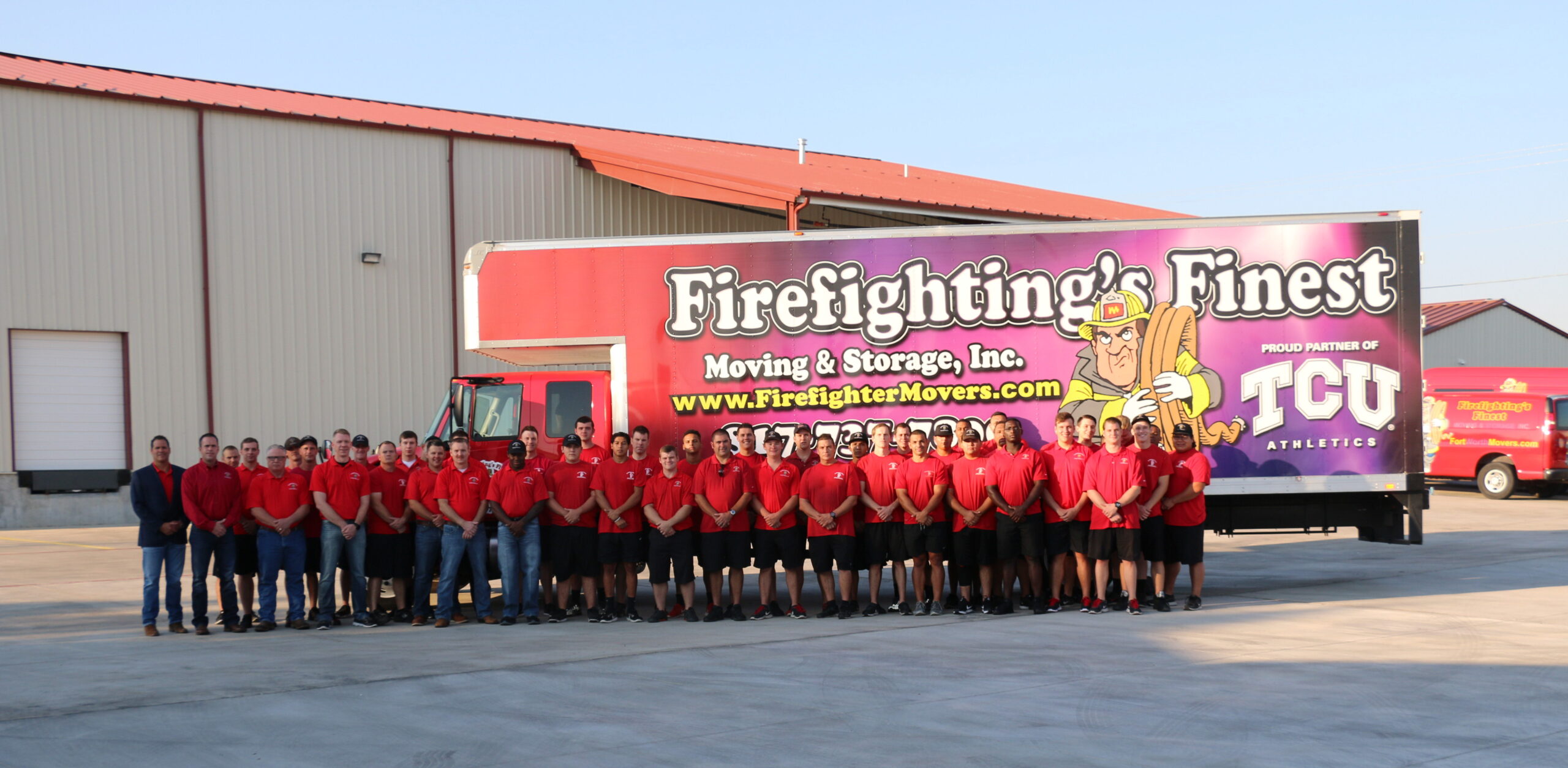 Firefighting's finest moving team posting for team photo