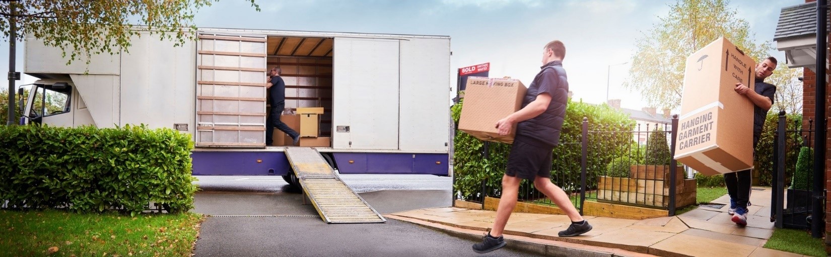 movers loading a moving truck